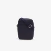 Bolso clásico Petit Piqua con cremallera para hombre