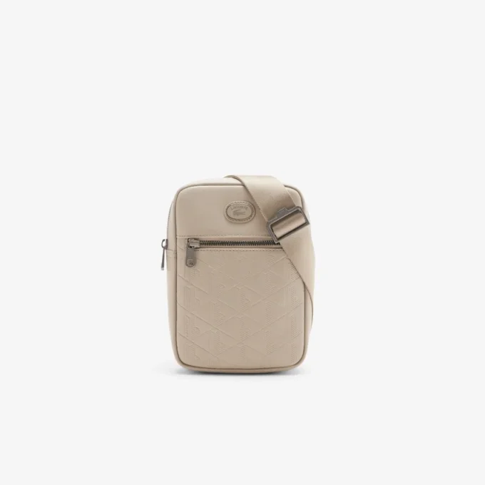 Bolso tipo cartera con monograma