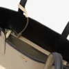 Bolso tote reversible y bolsa Anna