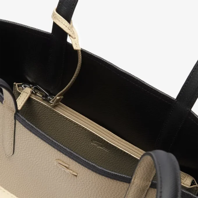 Bolso tote reversible y bolsa Anna