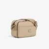 Bolso vertical de cuero con monograma