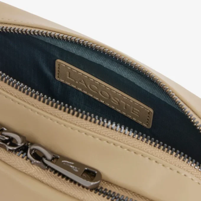 Bolso vertical de cuero con monograma