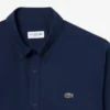 Camisa de popelín elástico de corte regular