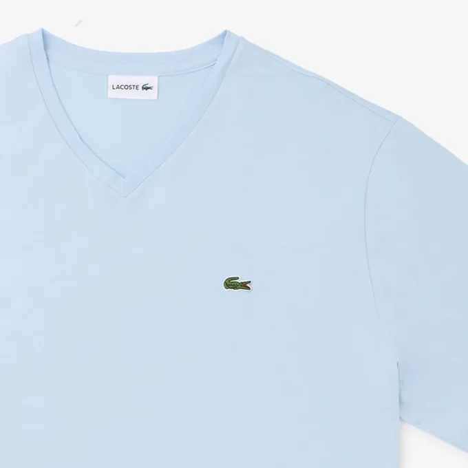 Camiseta de algodón con cuello en V acanalado y corte alto para hombre