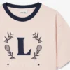 Camiseta de algodón con insignia en contraste