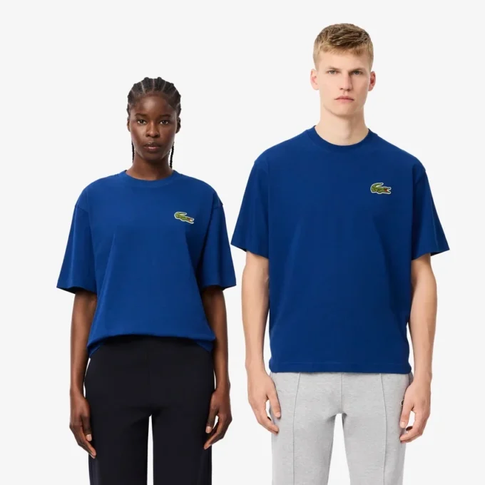 Camiseta unisex de corte holgado en algodón grueso con insignia