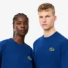 Camiseta unisex de corte holgado en algodón grueso con insignia