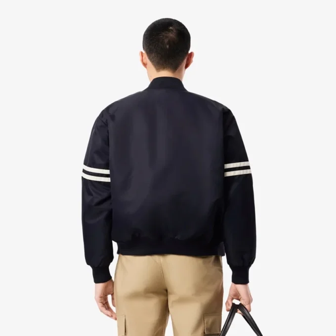 Chaqueta bomber repelente al agua con insignia bordada para hombre