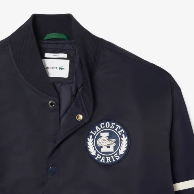 Chaqueta bomber repelente al agua con insignia bordada para hombre