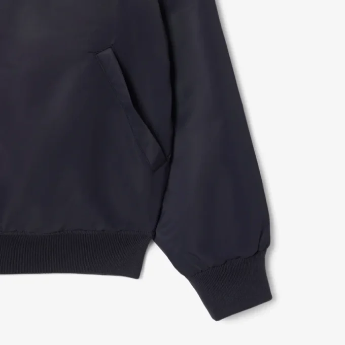 Chaqueta bomber repelente al agua con insignia bordada para hombre