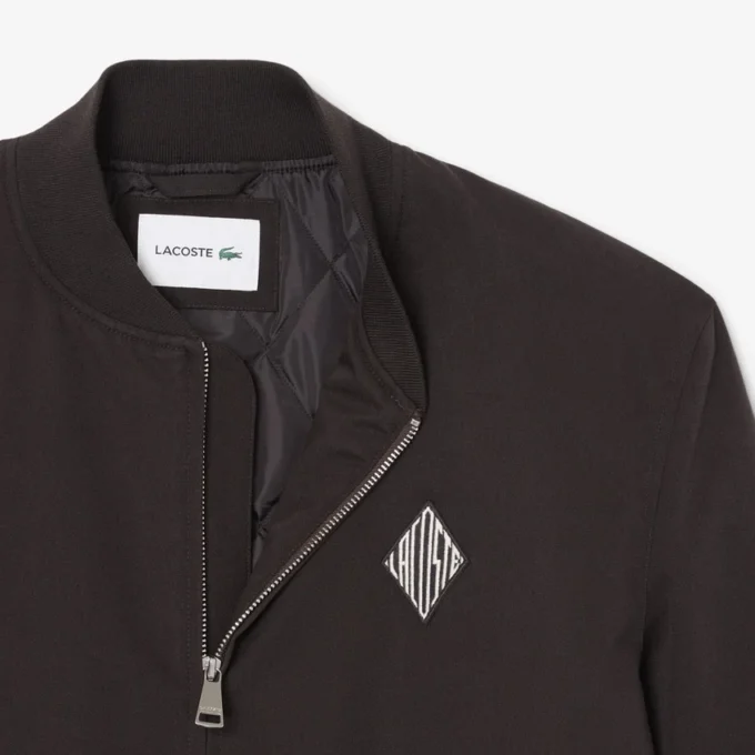 Chaqueta bomber retro con insignia y repelente al agua