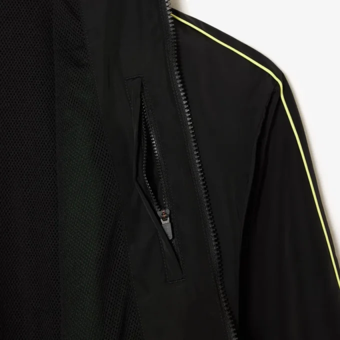 Chaqueta con cremallera resistente al agua y detalles en contraste para hombre