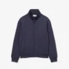 Chaqueta con cuello alto y bordado característico