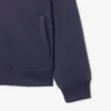 Chaqueta con cuello alto y bordado característico