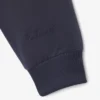 Chaqueta con cuello alto y bordado característico