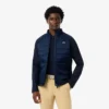 Chaqueta de golf acolchada de cuello alto para hombre