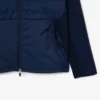 Chaqueta de golf acolchada de cuello alto para hombre