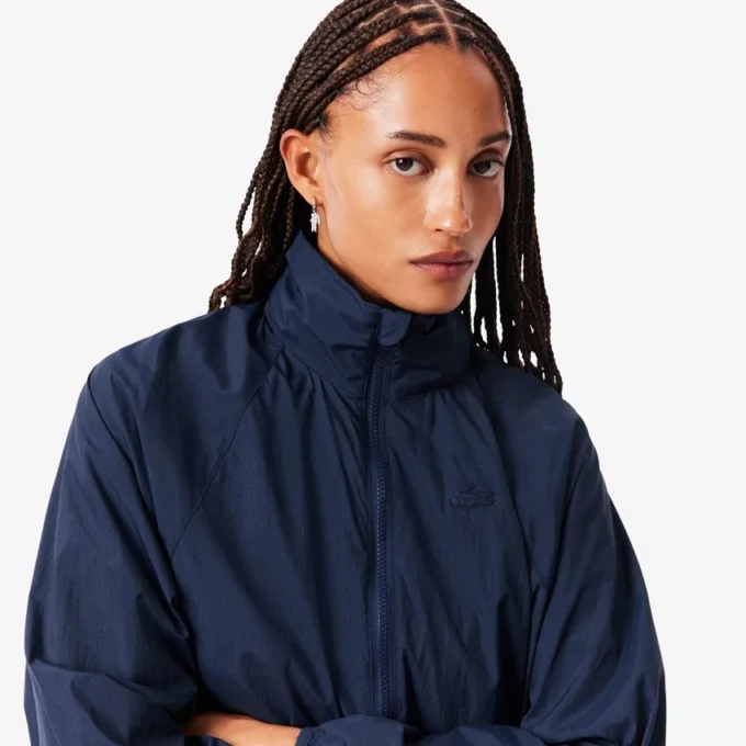 Chaqueta deportiva con capucha para mujer