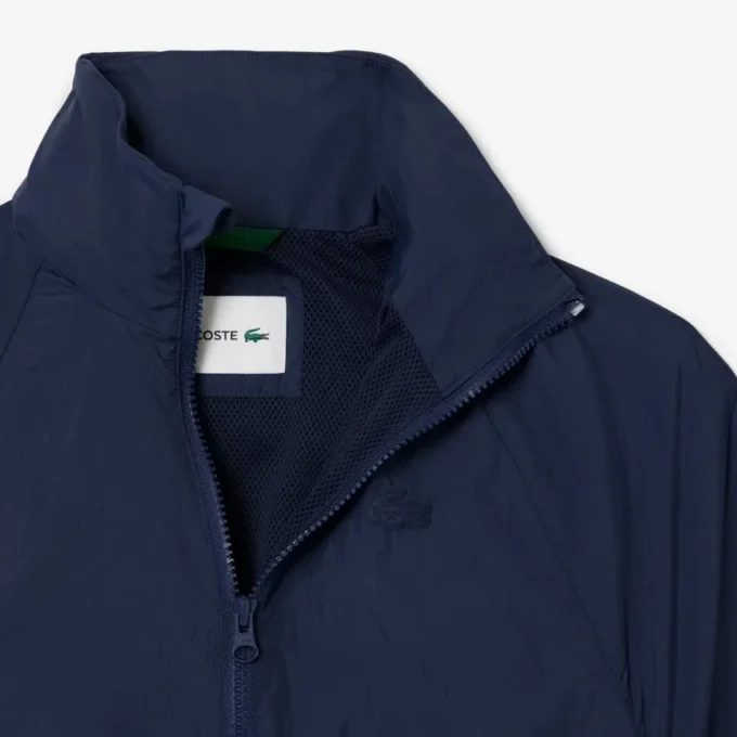 Chaqueta deportiva con capucha para mujer