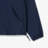 Chaqueta deportiva con capucha para mujer