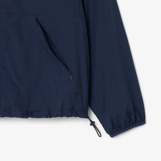 Chaqueta deportiva con capucha para mujer