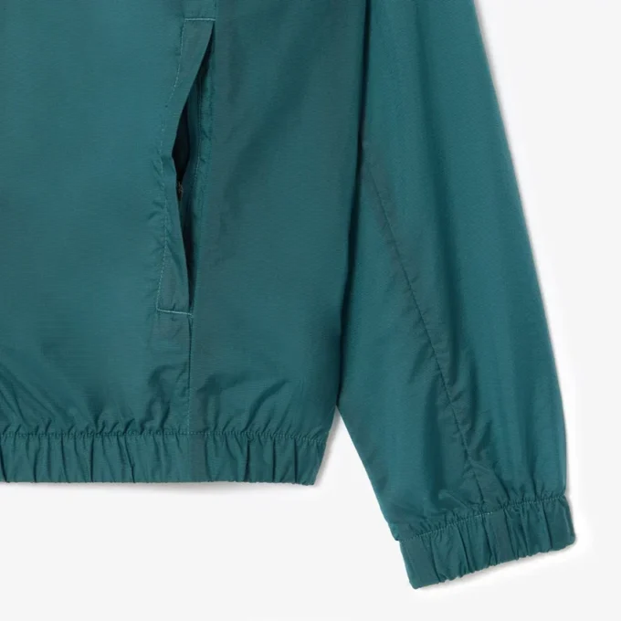Chaqueta deportiva ligera y repelente al agua para hombre