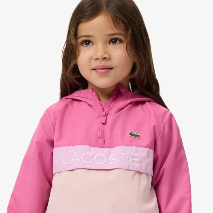 Cortavientos unisex con capucha