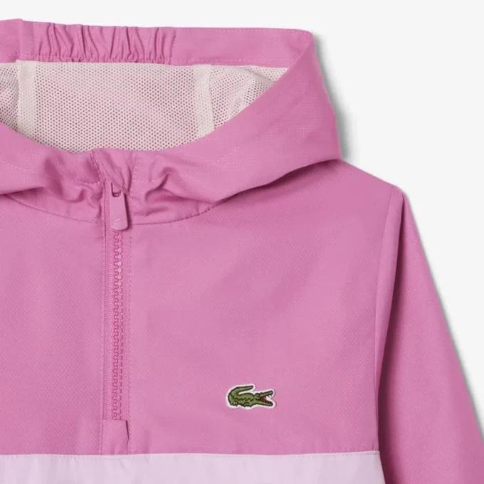 Cortavientos unisex con capucha
