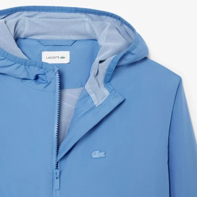 Cortavientos unisex con capucha