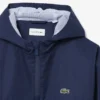 Cortavientos unisex con capucha