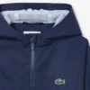 Cortavientos unisex con capucha