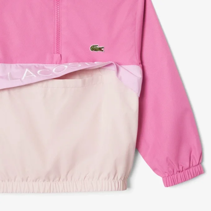 Cortavientos unisex con capucha