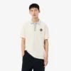 Fabricado en Francia. Polo clásico con insignia