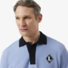 Fabricado en Francia. Polo clásico con insignia