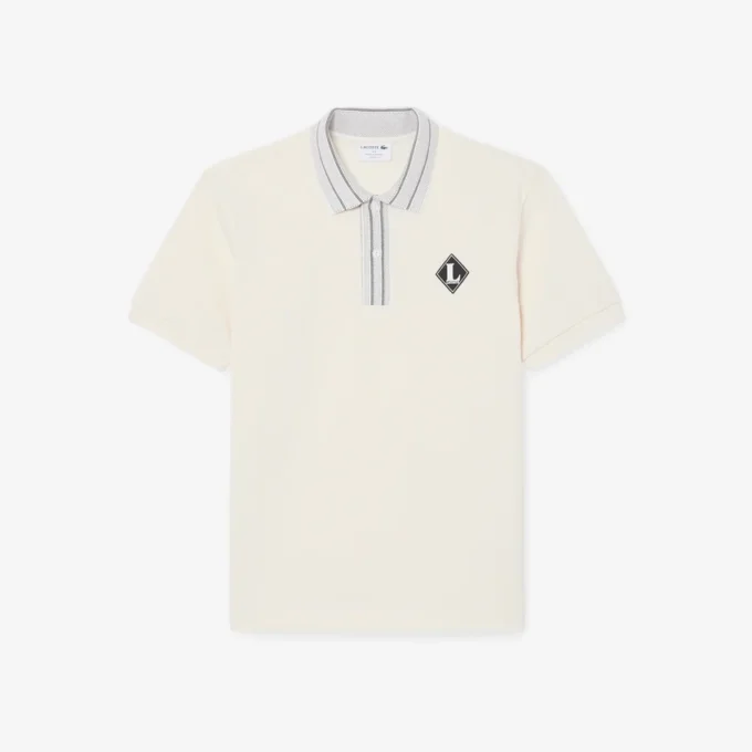 Fabricado en Francia. Polo clásico con insignia