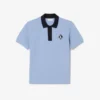 Fabricado en Francia. Polo clásico con insignia