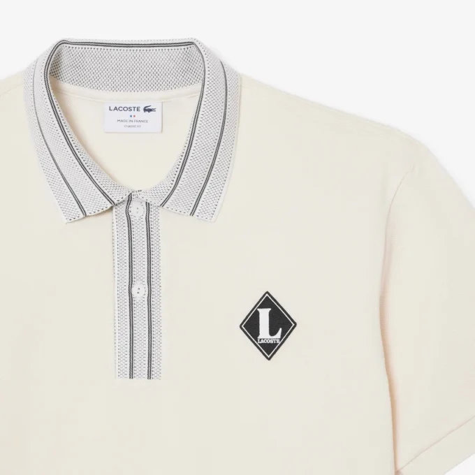 Fabricado en Francia. Polo clásico con insignia
