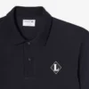 Fabricado en Francia. Polo clásico con insignia