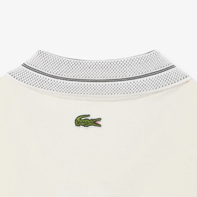 Fabricado en Francia. Polo clásico con insignia