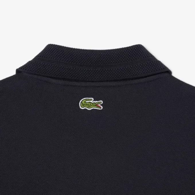 Fabricado en Francia. Polo clásico con insignia