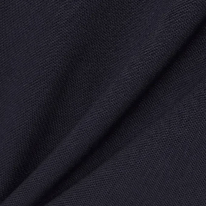 Fabricado en Francia. Polo clásico con insignia