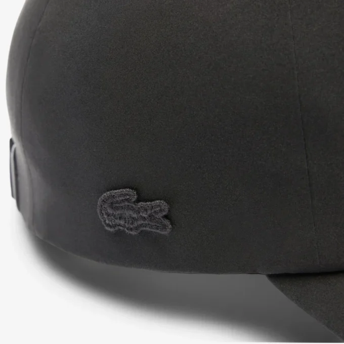 Gorra unisex repelente al agua con insignia