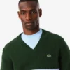 Jersey de cuello en V de lana a rayas para hombre