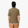 Jersey de cuello polo con punto trenzado de pasarela