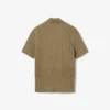 Jersey de cuello polo con punto trenzado de pasarela
