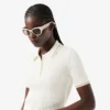 Jersey de cuello polo con tejido de punto trenzado a rayas