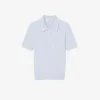 Jersey de cuello polo con tejido de punto trenzado a rayas