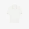 Jersey de cuello polo con tejido de punto trenzado a rayas