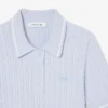 Jersey de cuello polo con tejido de punto trenzado a rayas