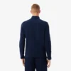 Jersey de golf de forro polar con cremallera de un cuarto para hombre